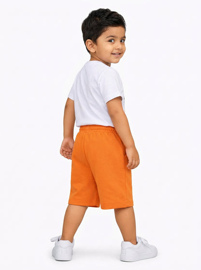 Little Play Together Penguin & Basketball Graphic Toddler Shorts in Orange.